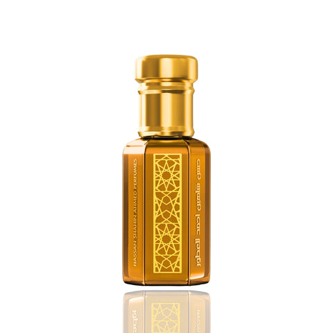 Hassan Shahin Ahmed Perfumes oil concentrate bottle with gold cap and geometric pattern